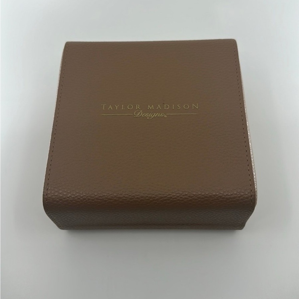 New/unused. Taylor Madison travel jewelry box. Faux leather.